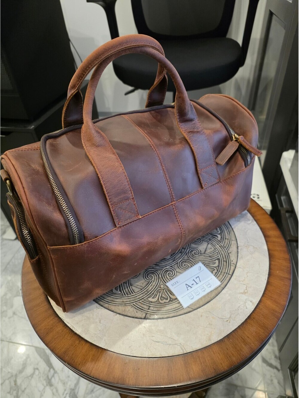 Distressed Brown Weekender Duffel Bag with Gold Zippers and Top Handles